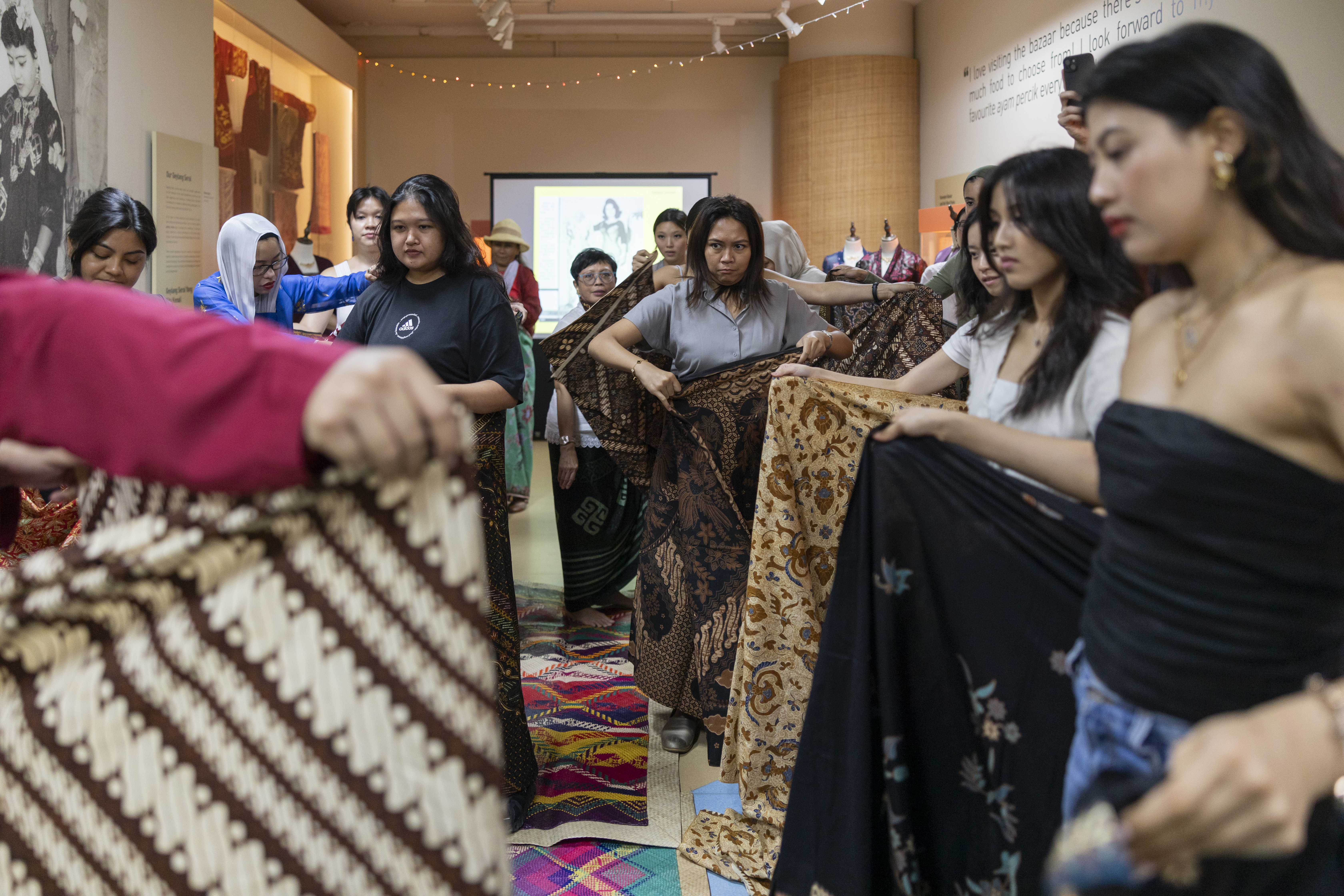 Mari Berkain with kebaya societé